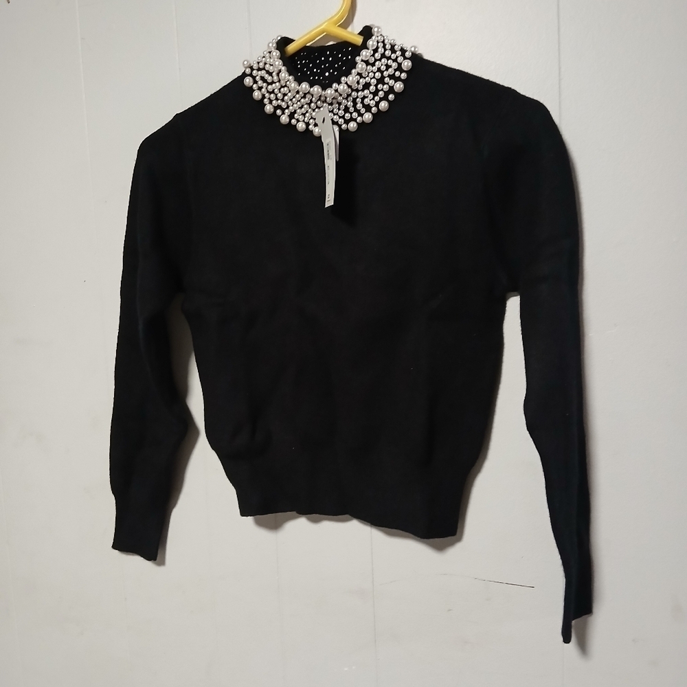 River island ladies black sweater. Size 8 petite. Sequins around neck.